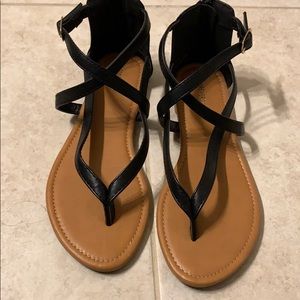 These are black strapped sandals